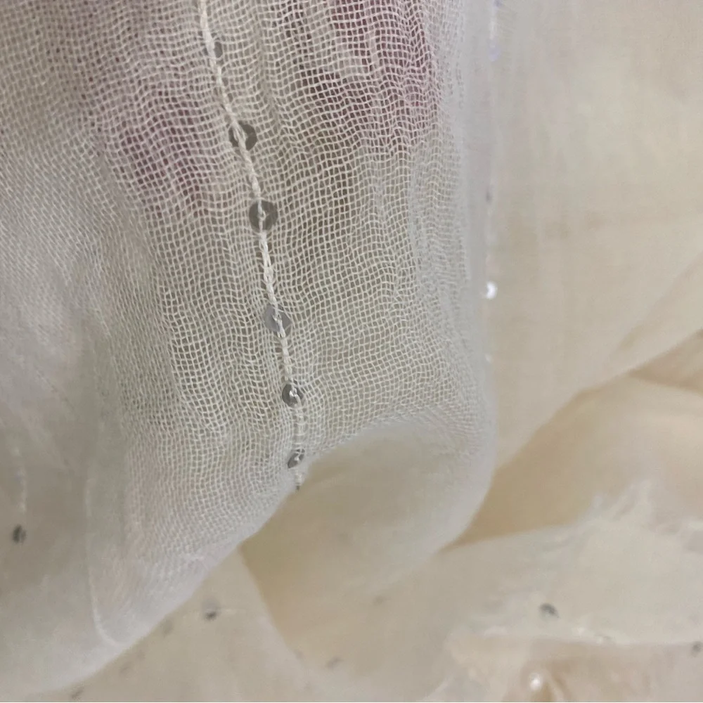 Gap wrap in white with sequins looks elegant